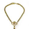 Best Sale Manita de cordón con corazón calado y alianzas entrelazadas oro 18k - 19cm Pulseras De Oro|Manitas